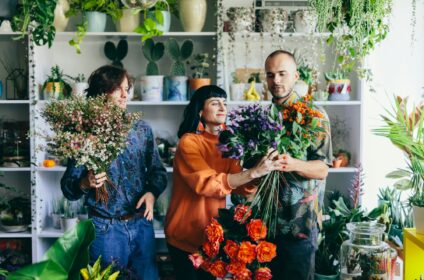 Team of florist work in flower store with teamwork spirit.